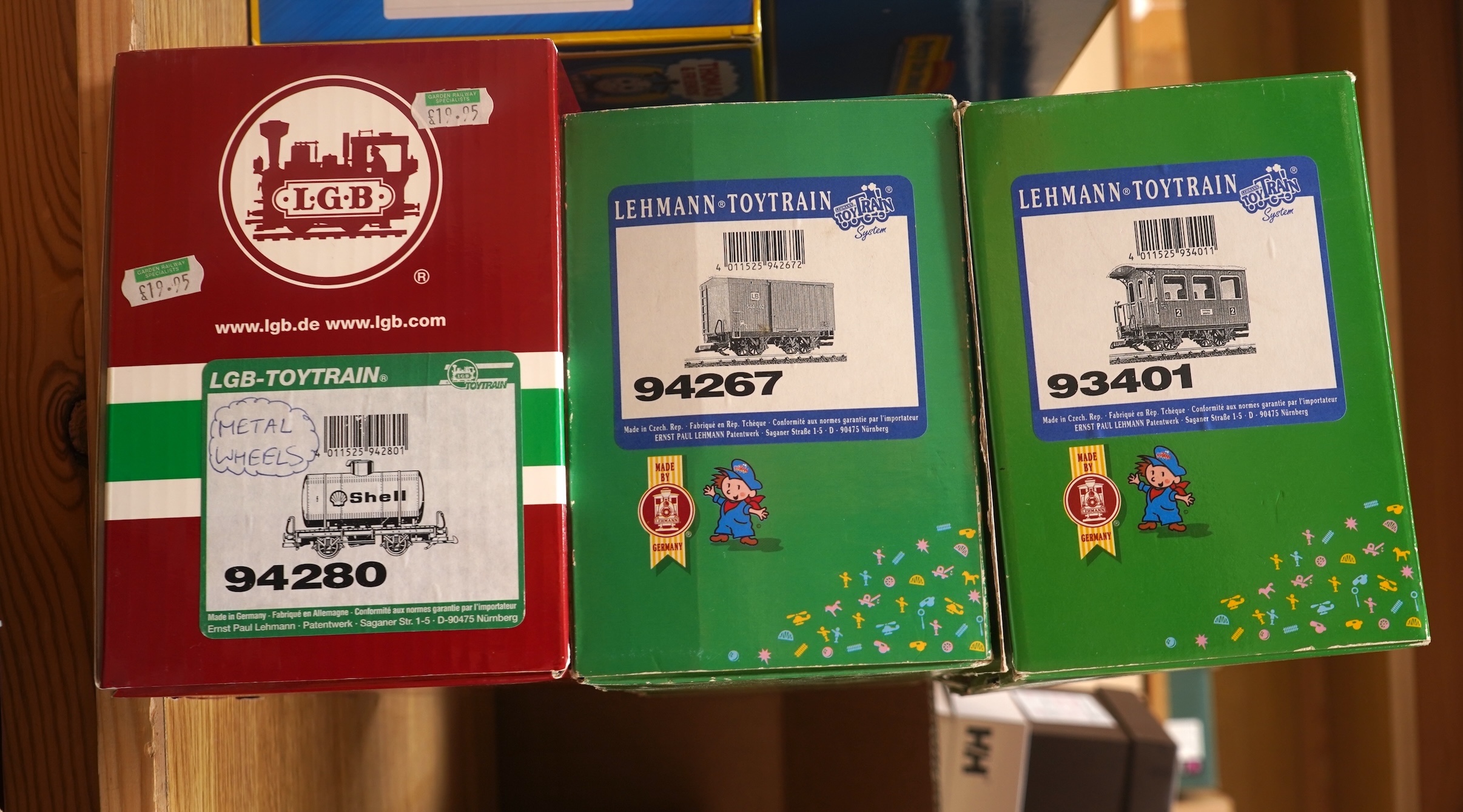 Four Lehmann and Bachmann G scale (45mm gauge) freight wagons; an unconstructed Bachmann Big Haulers G Kits 4-door Baggage Car (98910), an LGB 4-wheel coach in associated box, plus two others by Lehmann Toytrain in assoc